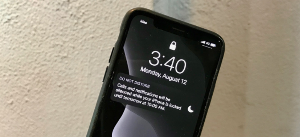 iPhone Lock screen showing Do Not Disturb notification
