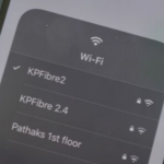 Selecting a different Wi Fi network from the popup in Control Center on iPhone on iOS 13
